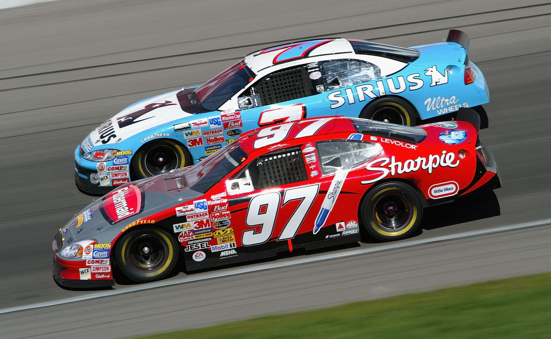 Kurt Busch (97) side by side with Jimmy Spencer (7 ) during the 2007 NASCAR Winston Cup Banquet 400. Source: Getty